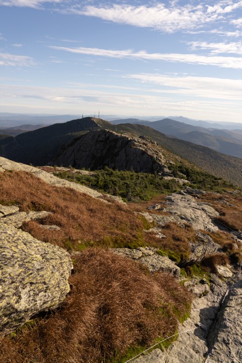 Rocky summit ridge under a clear sky