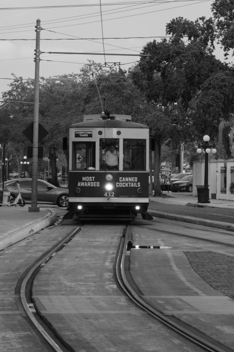 Vintage streetcar approaching down the tracks